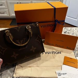 Louis Vuitton AUTHENTIC On the Go Pm. Monogram/reverse monogram. Bag only